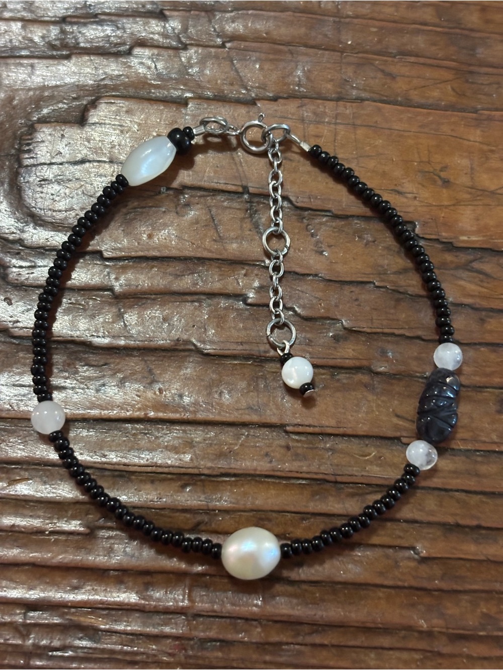 Delicate Black Seed Bead Bracelet with White Pearl Accent